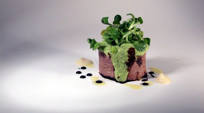 Veal tongue with emulsion of gree sauce