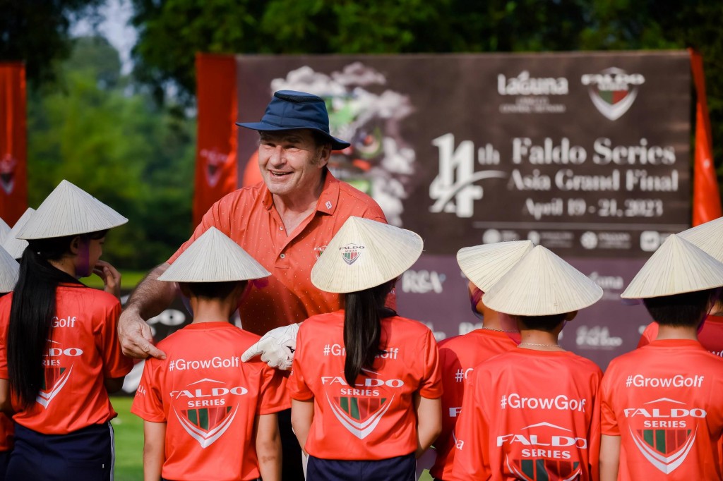 Sir Nick Faldo with kids at Golf Clinic at the 14th Faldo Series Asia Grand Final 2023 .jpg