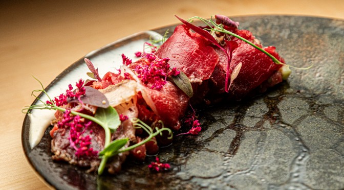 Wagyu, cooked, raw and Bresaola, potatoes, hazelnuts, coffee demiglace